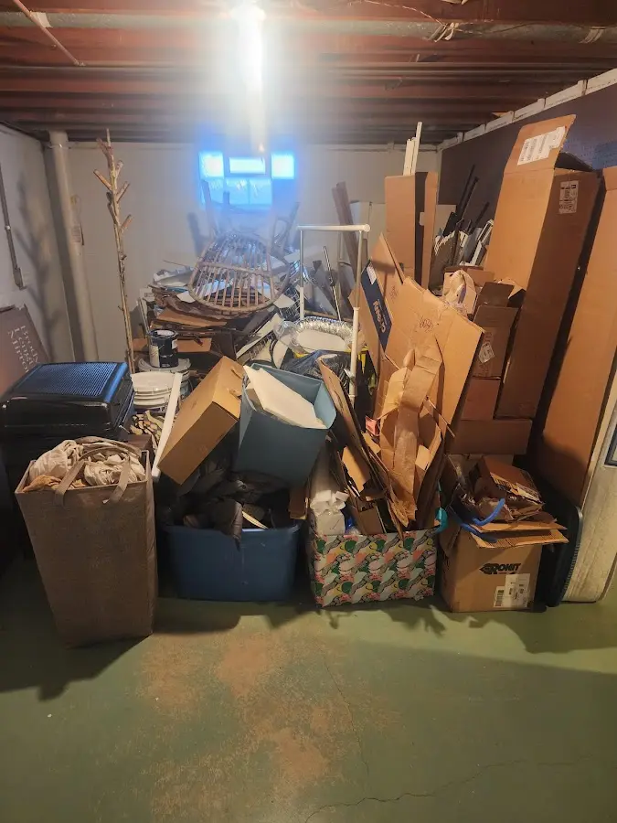 Roll-off dumpster container at job site for Yard Waste Dumpster Rental in Lincoln Park